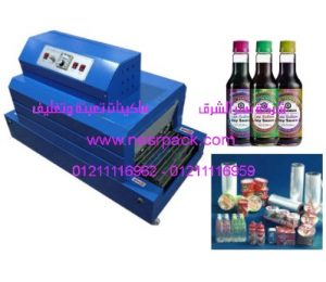 ماكينة تغليف زجاجات الباربيكيو صوص بالشرينك الحرارىpvc موديل 101 المقدمة من شركة نسر الشرق ماكينات تعبئة وتغليف