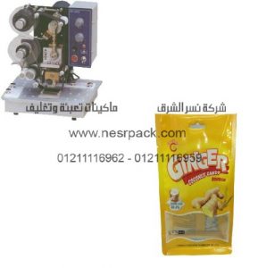ماكينة طباعة تاريخ الانتاج وتاريخ الصلاحية علي أكياس حلوي جوز الهند